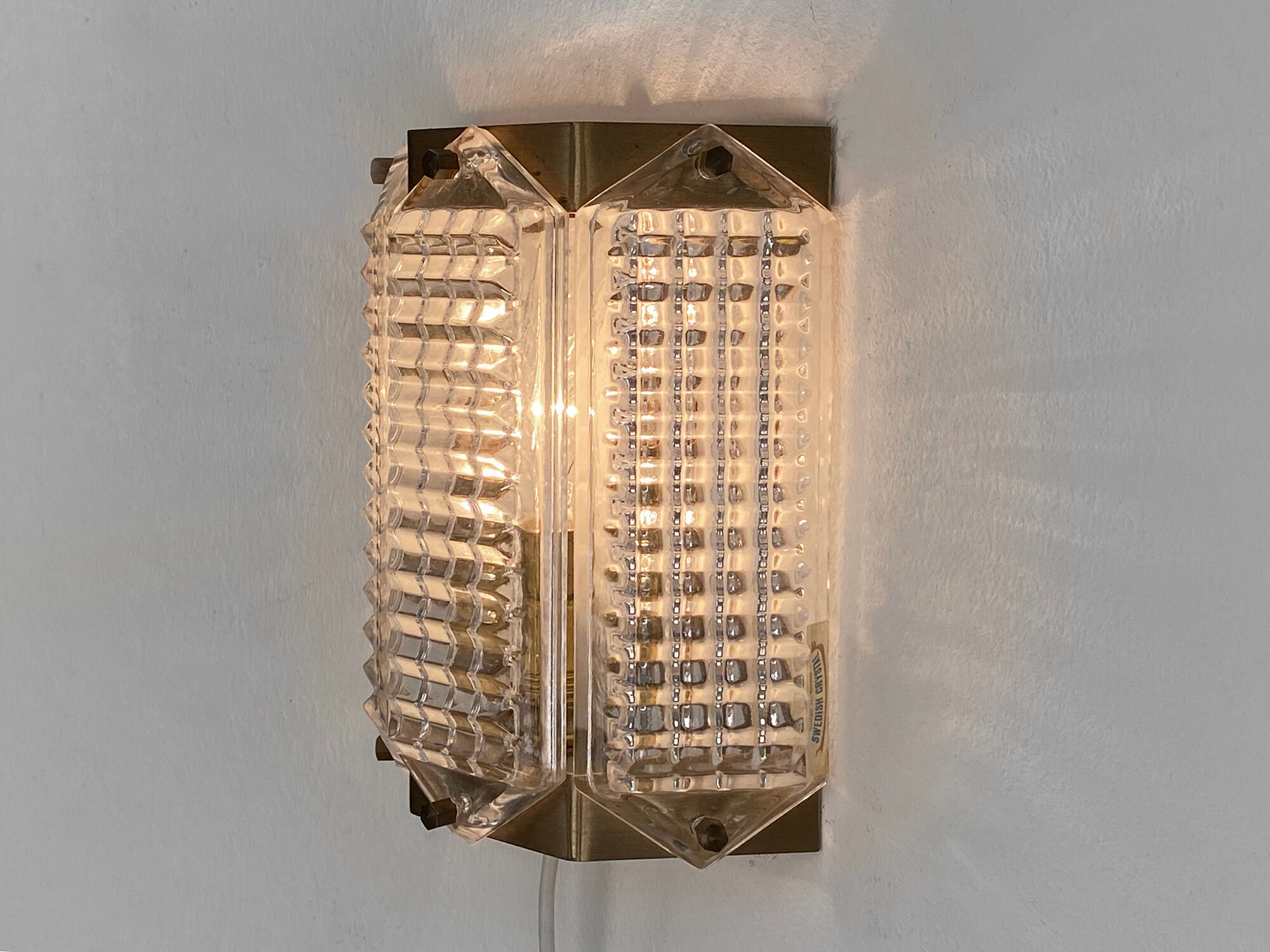 Brass and glass wall light/Sconce by Wiktor Berndt for Flygsfors. Sweden 1960s