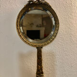 Hand mirror in gilded bronze
