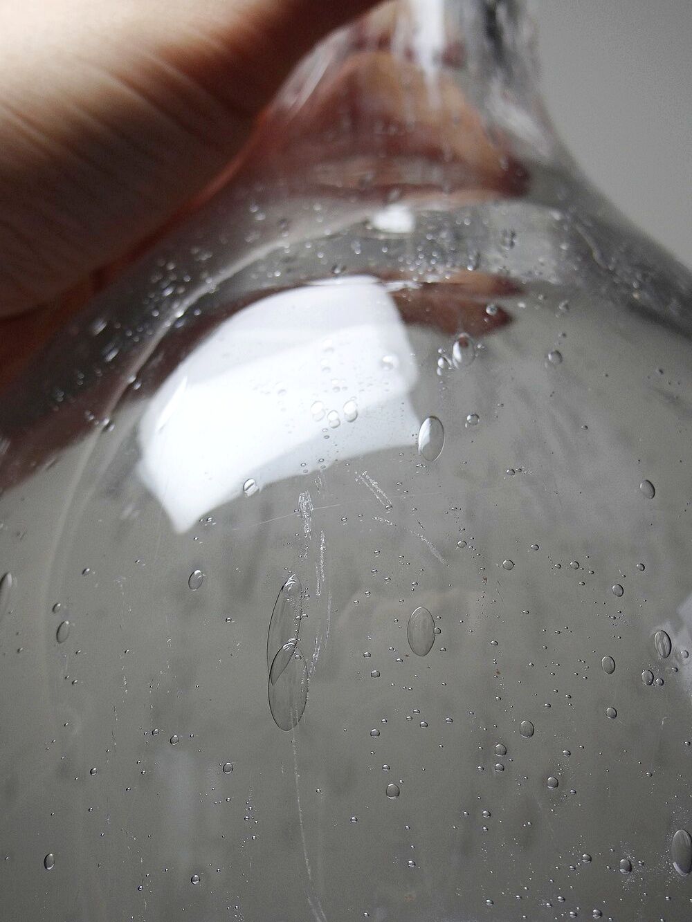 Large antique blown glass bottle with bubbles, early 20th century 1900-1920.