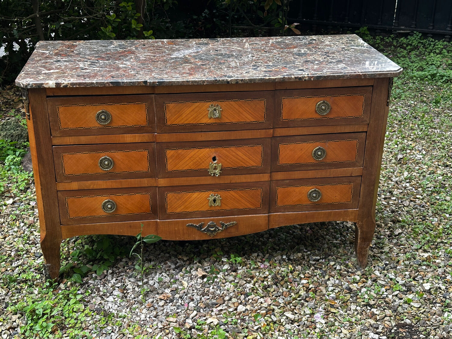 Transitional Louis XV - Louis XVI commode from the 19th century.