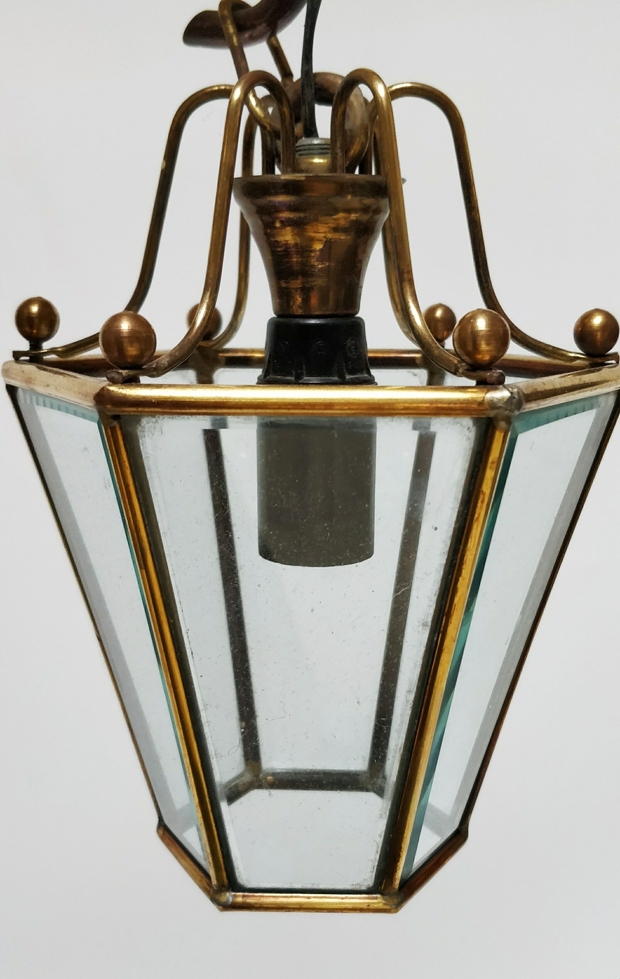 Brass lantern and beveled glasses