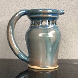 Stoneware pitcher.