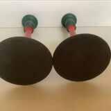 Pair of cast iron and wood candle holders