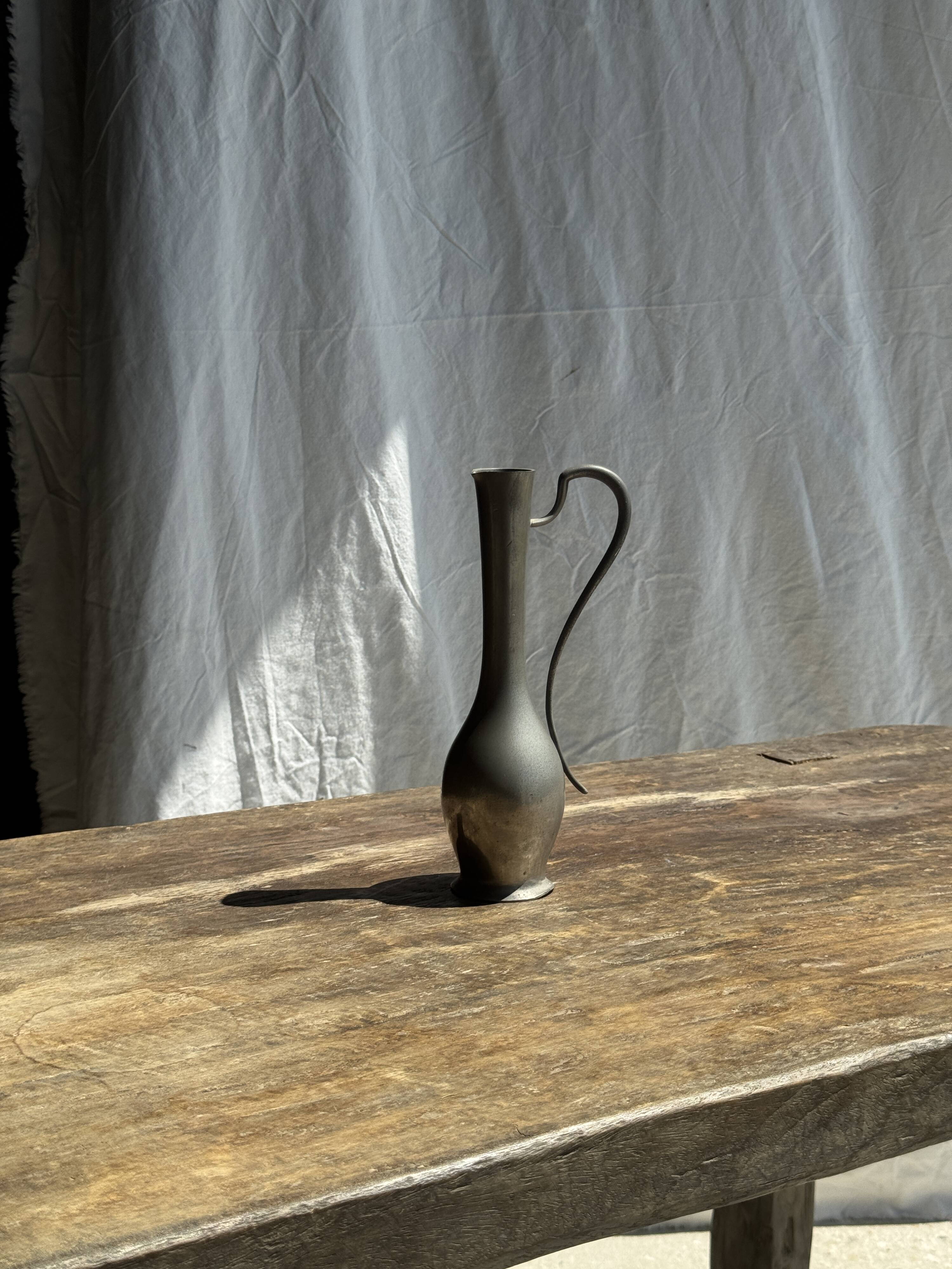 Small 19th century pewter jug, 95% hallmark H20.5
