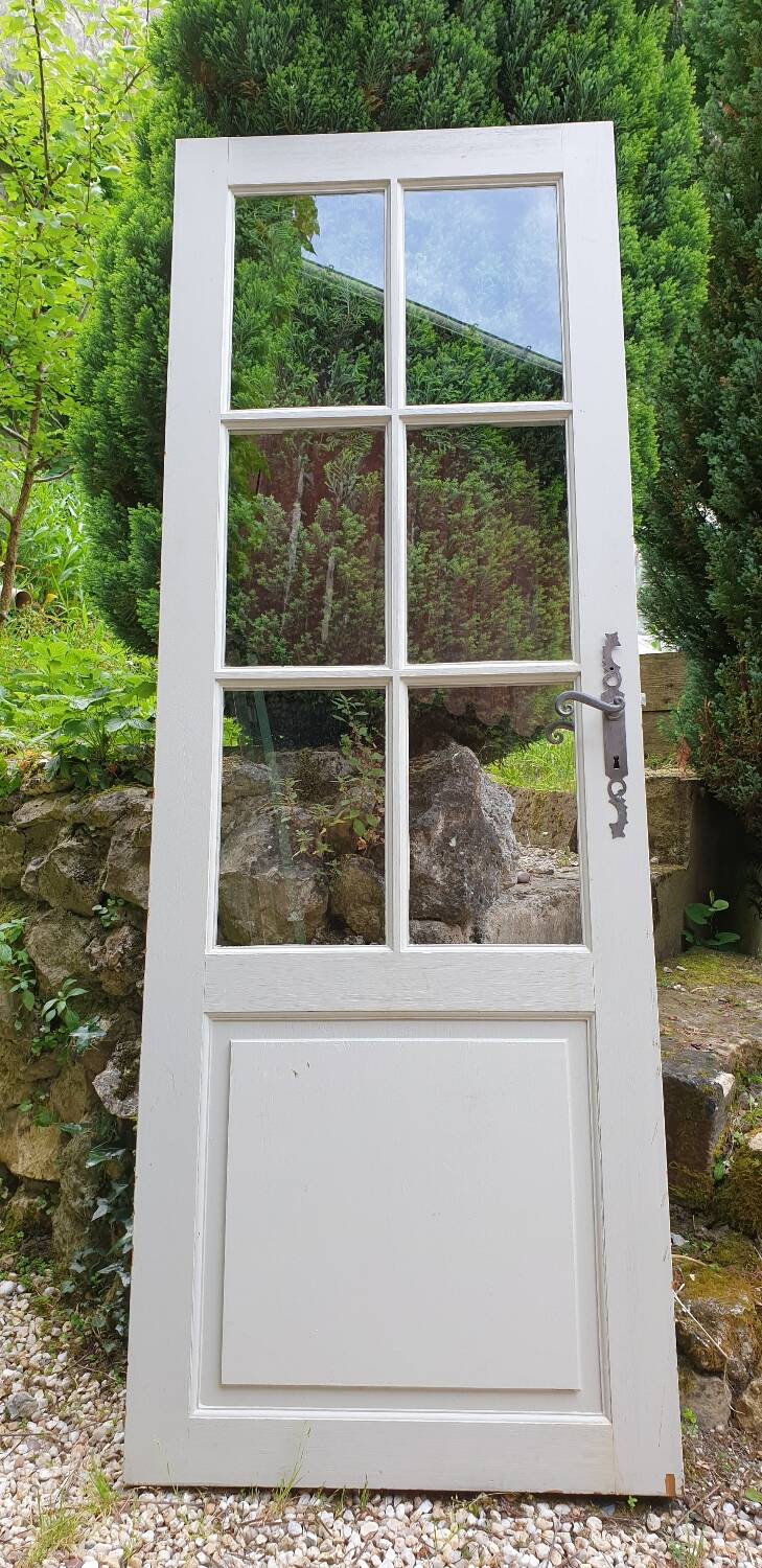 Old wooden door with small squares