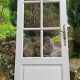 Old wooden door with small squares