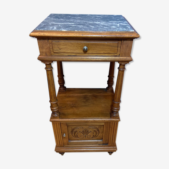 Old bedside table with marble top