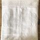 Old embroidered cloth, monograms and lace