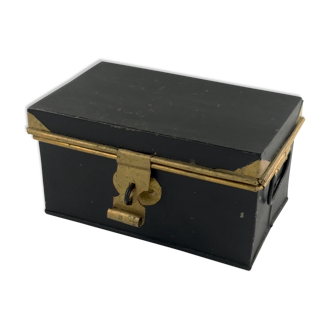 Antique box in black and gold metal