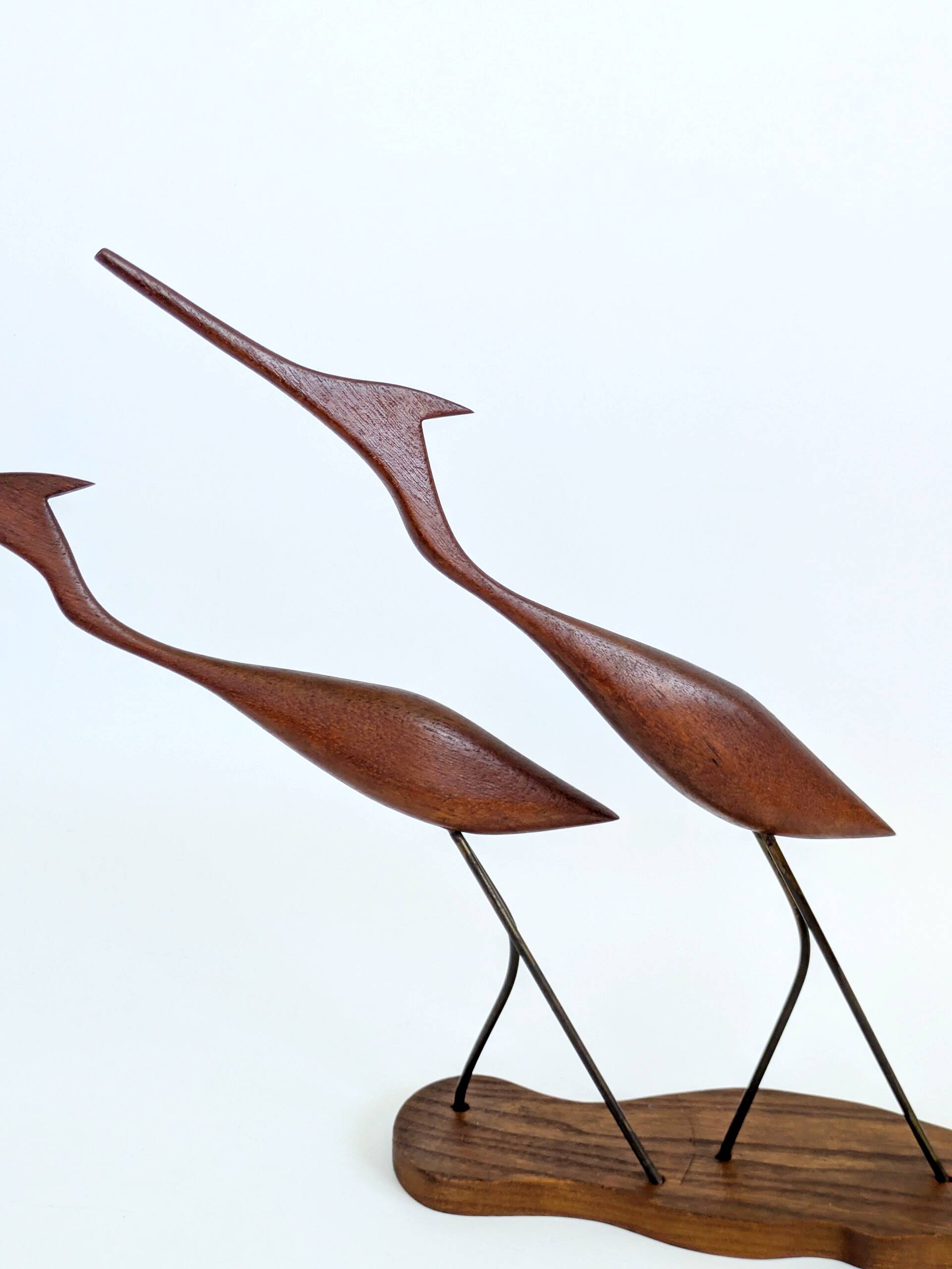 Scandinavian modernist sculpture cranes in teak.