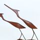 Scandinavian modernist sculpture cranes in teak.