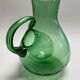 Large green glass cooling jug