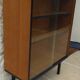 Storage unit, display cabinet with sliding glass doors, metal base