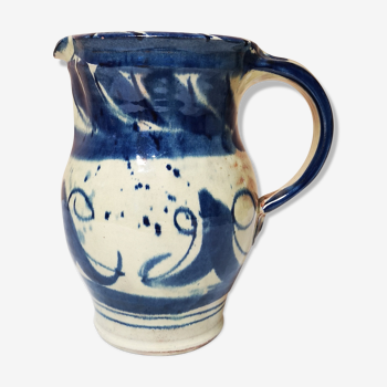 Enamelled ceramic blue pitcher signed by the artist