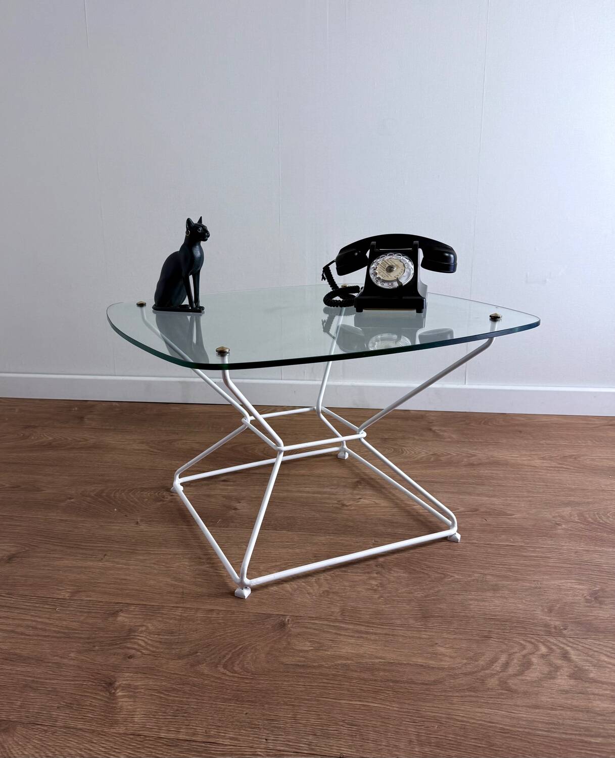 Glass coffee table with steel base