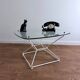 Glass coffee table with steel base