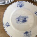 Series of 11 flat plates, Dutch earthenware, early XX