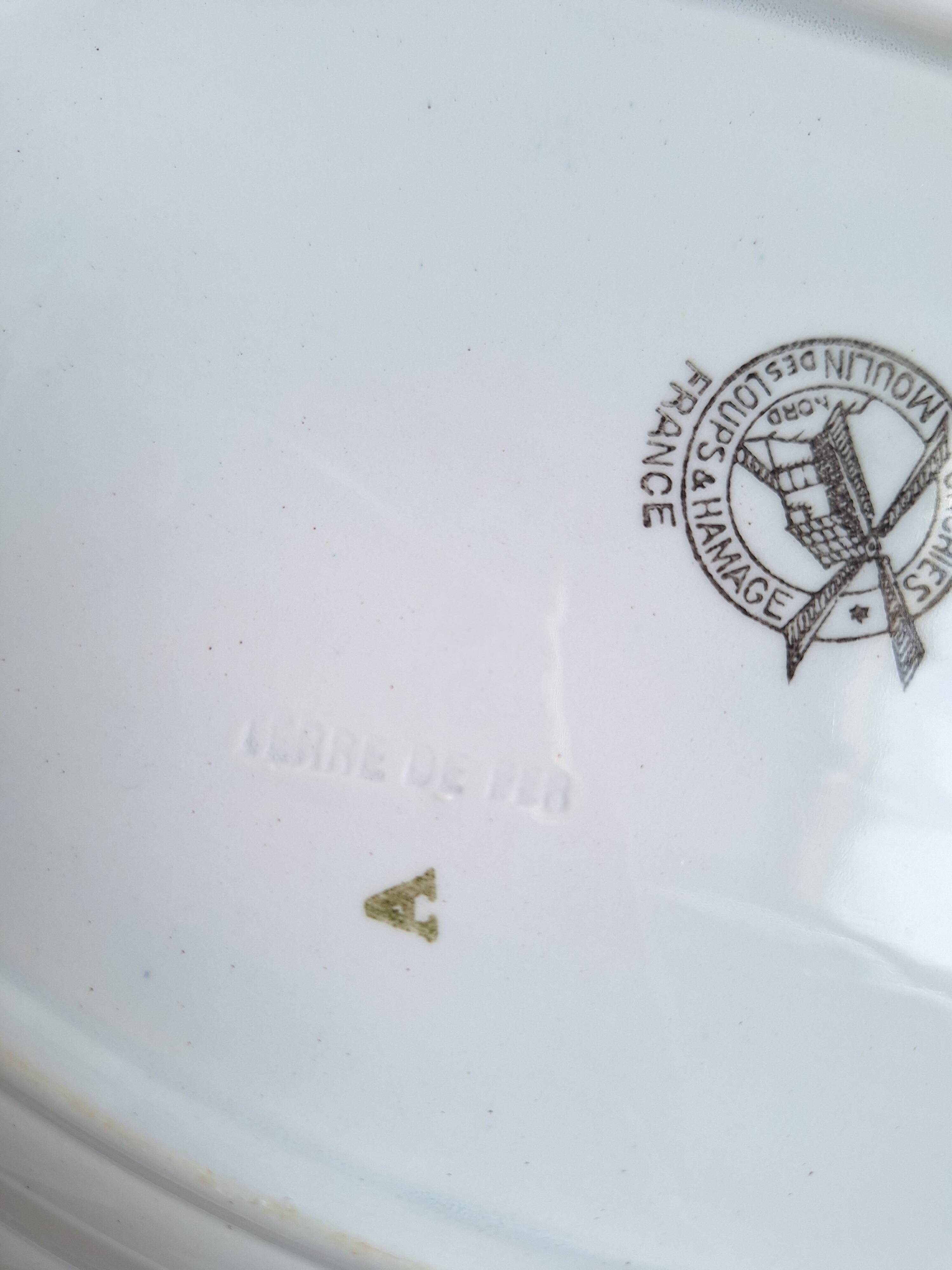 Oval plate Moulin des Loups Canada blue and orange, 1920-40