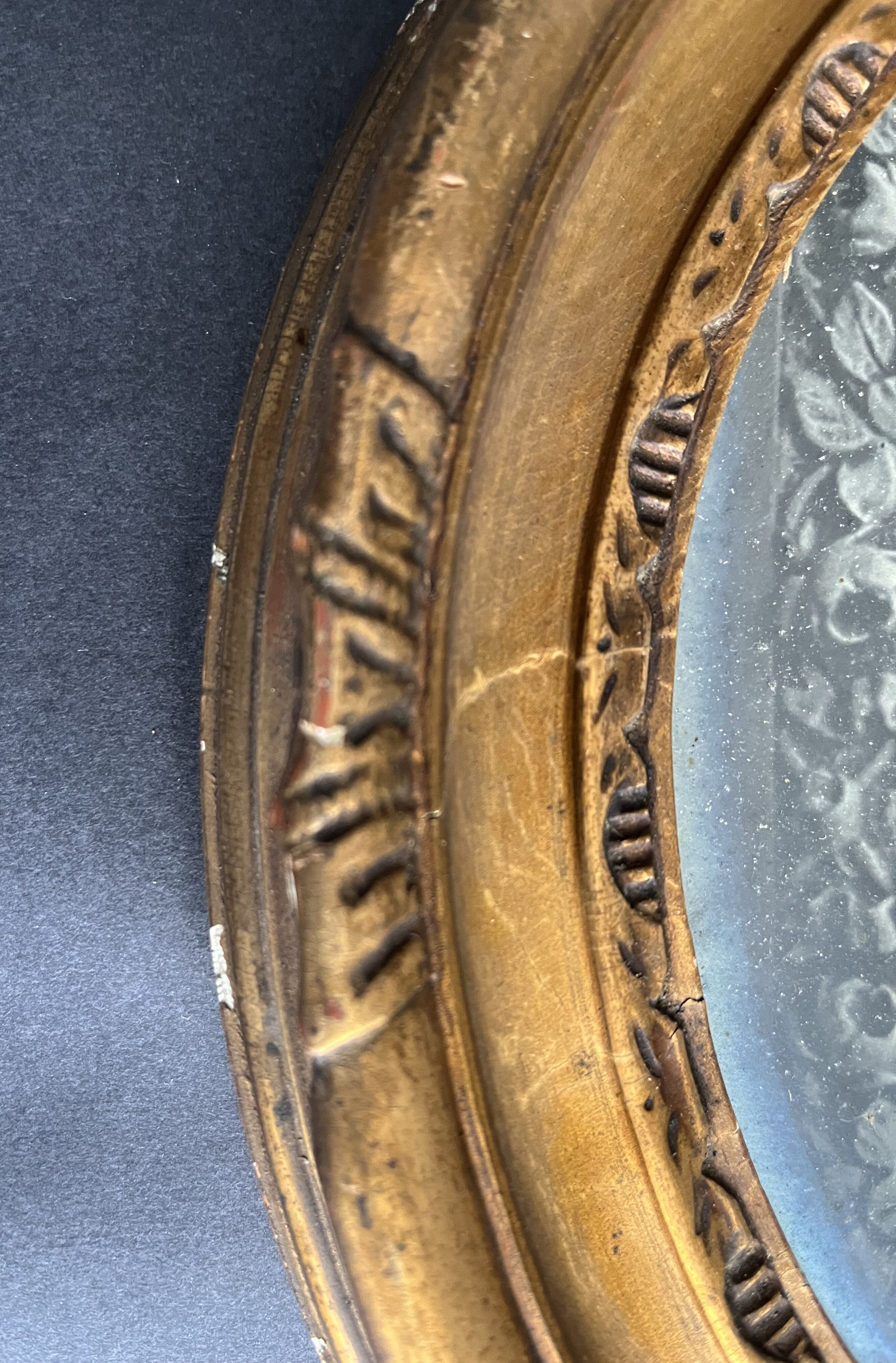 Carved and gilded wooden frame