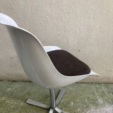 Roche Bobois tulip chair in moulded plastic with a chrome star base.