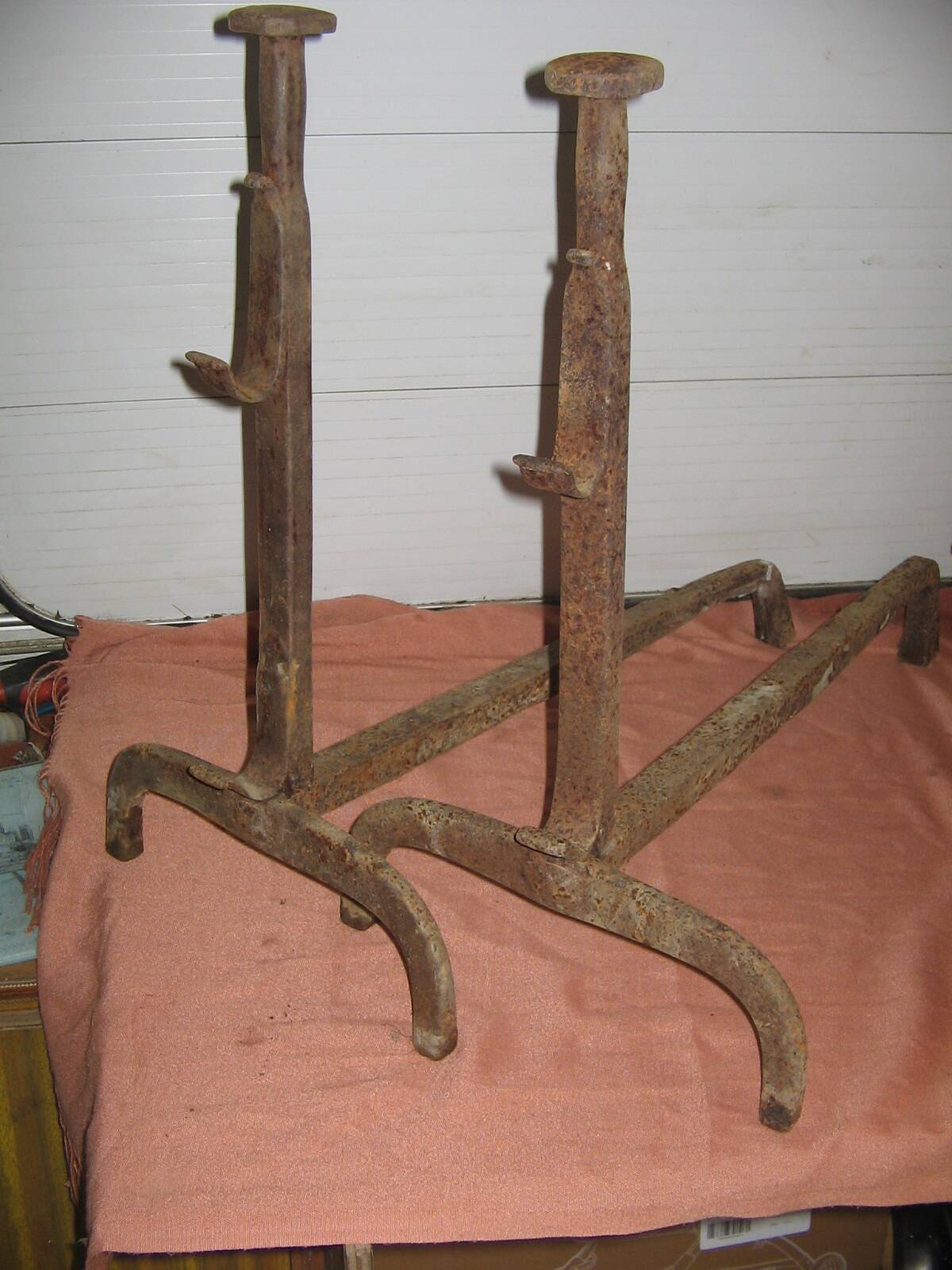 Old wrought iron andirons