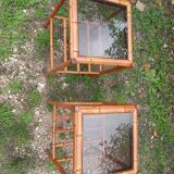 Pair of bamboo and smoked glass tables