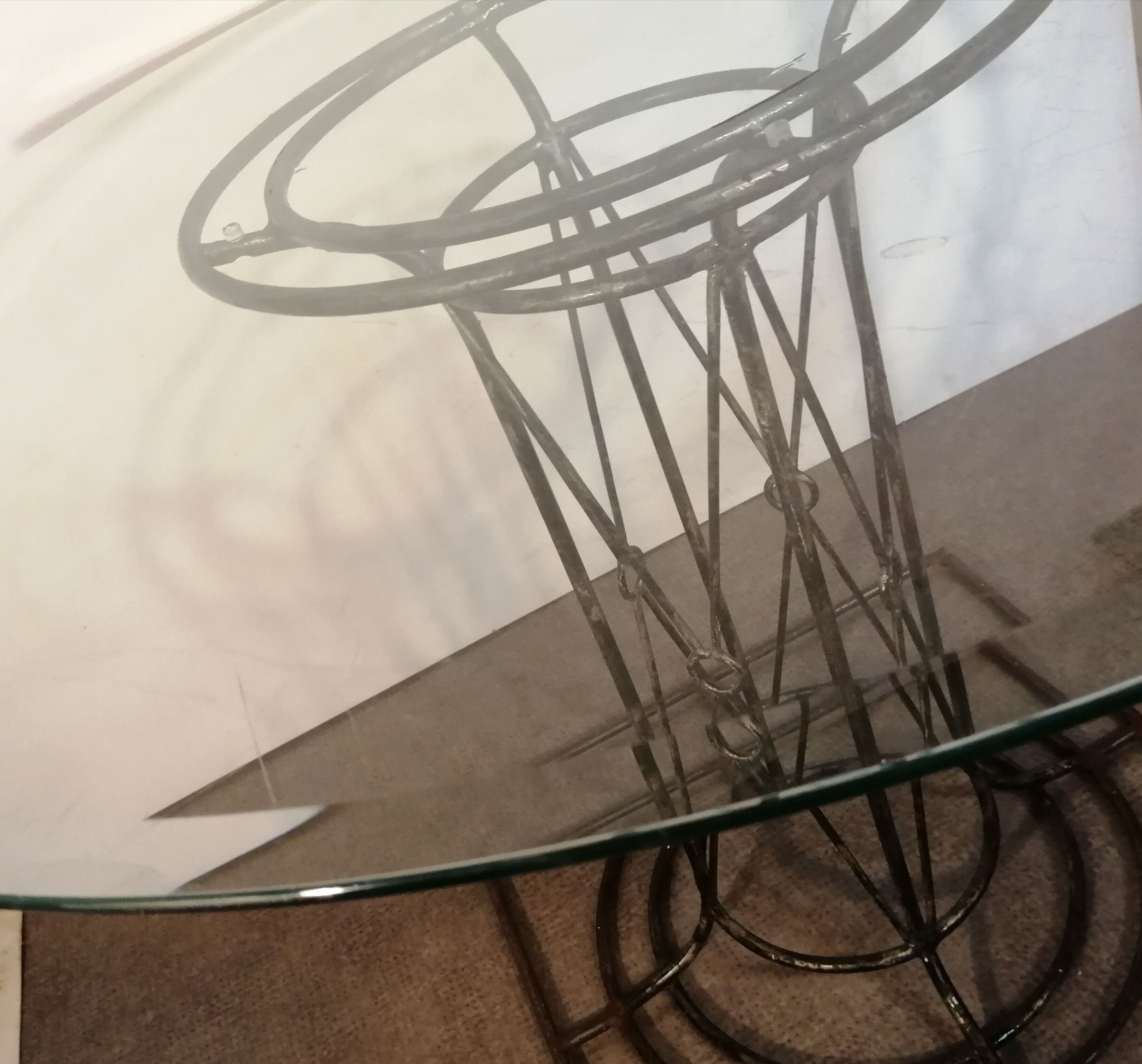 Wrought iron dining table with beveled round glass top, vintage 1980