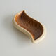 Beige and off-white ceramic ravier