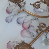 Antique chandelier with its papillae, reflection changing according to exposure