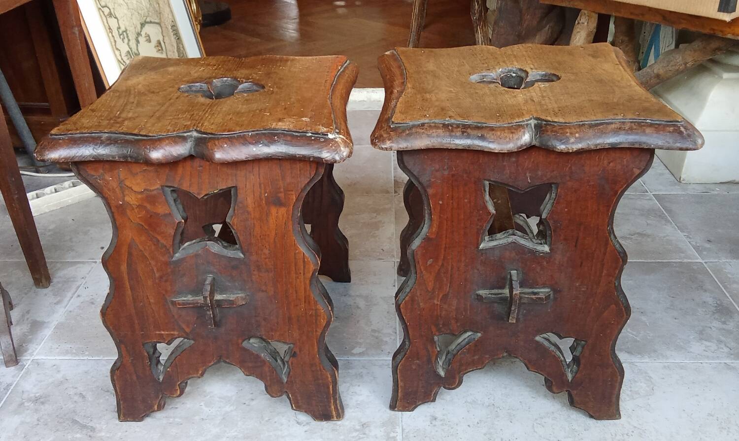 Pair of antique carved wooden stools
