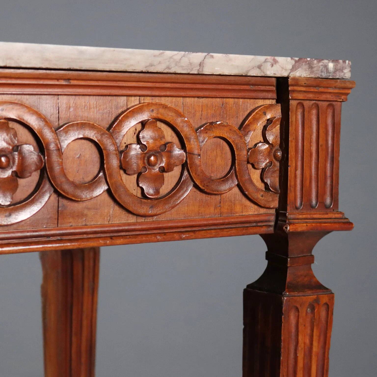 Antique neoclassical console in walnut with a marble top, 18th century.