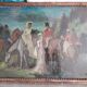 Antique oil painting depicting an equestrian scene.