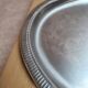 Vintage silver-plated metal tray with a segmented glass aperitif dish.