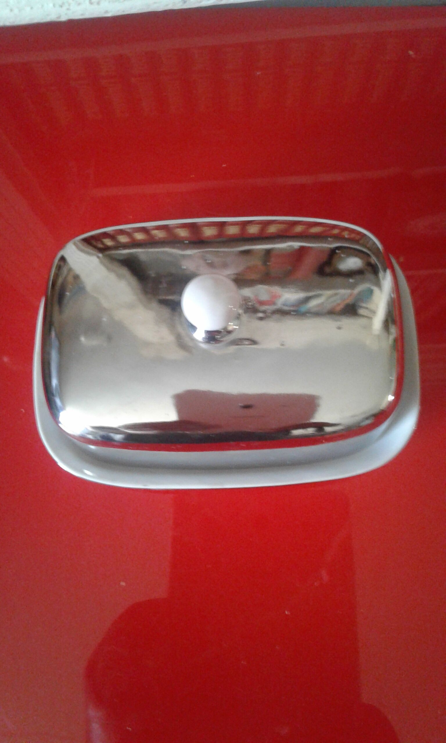 White and silver ceramic butter dish