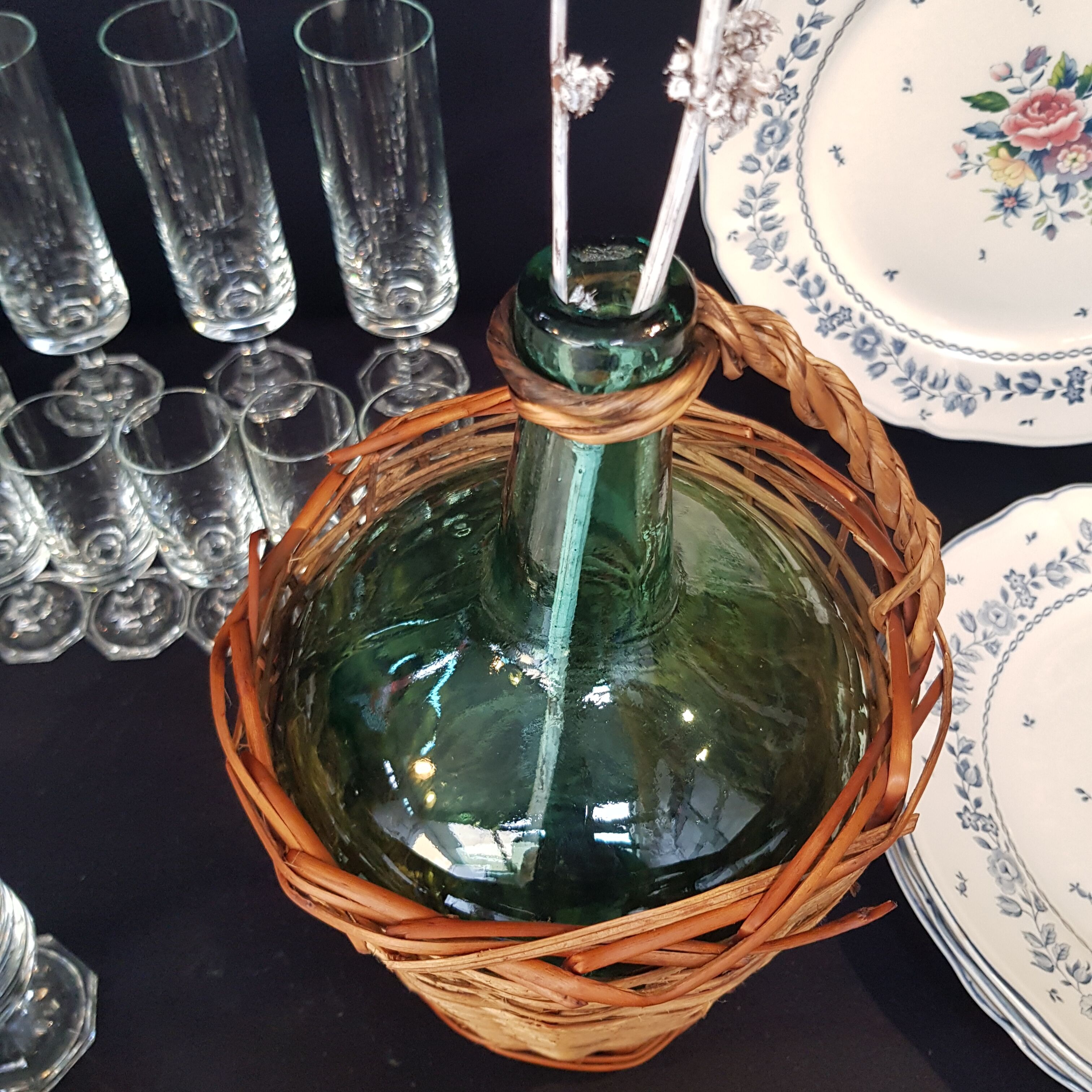 glass and rattan bottle