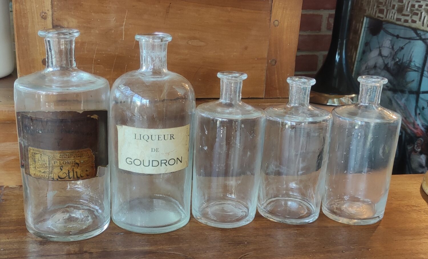 Series of 5 blown glass apothecary pharmacy bottles