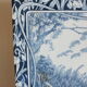 Old tile in Gien earthenware decoration hunting dog