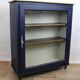 Vintage low glass-fronted library in midnight blue, 1950s.