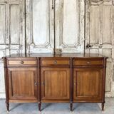 Louis XVI style enfilade in cherry wood, 20th century.