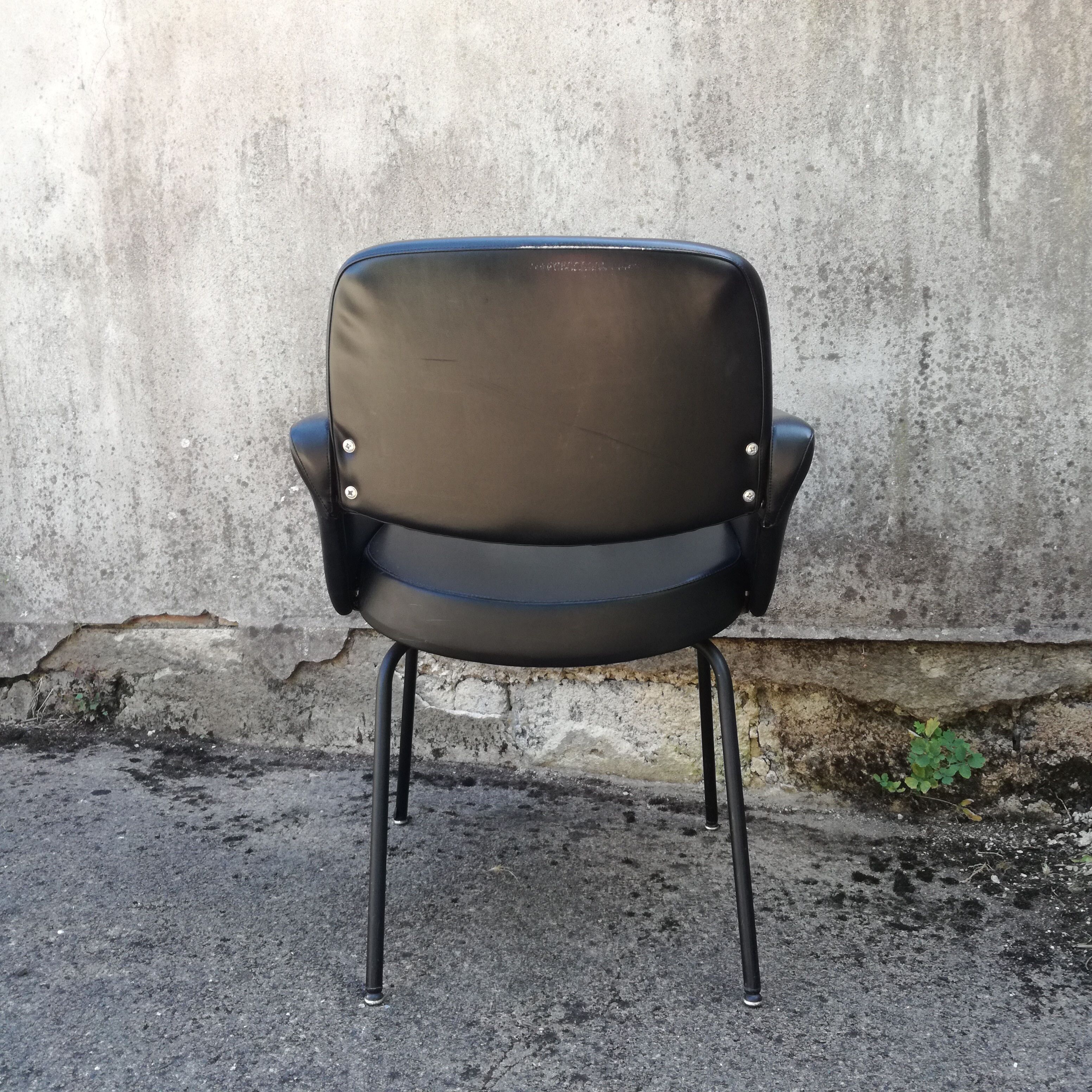 Black office chair in imitation leather