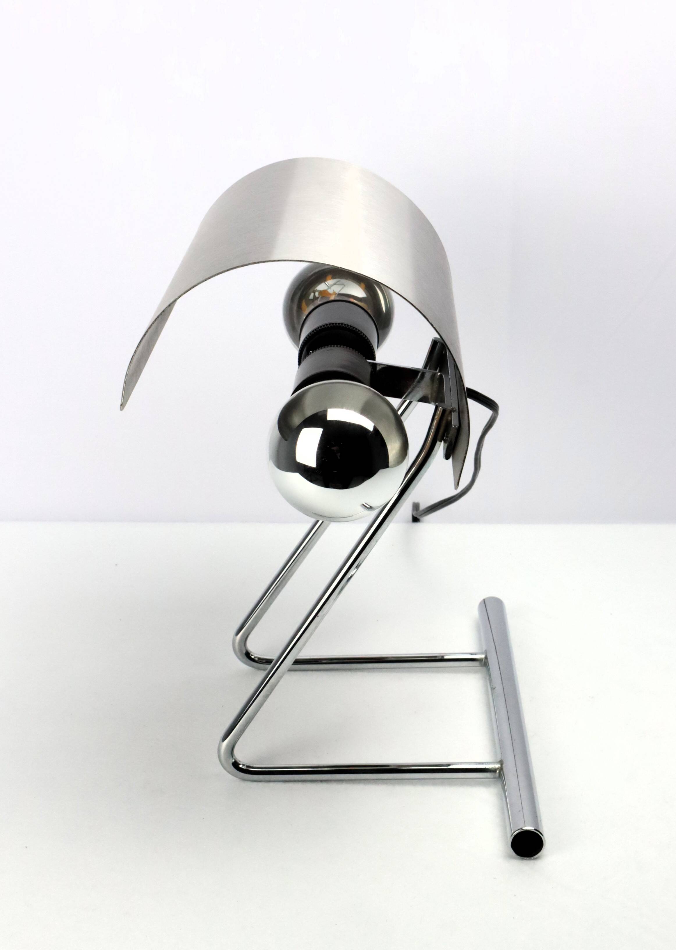 Stainless steel lamp from the 1970s in the style of François Monnet.