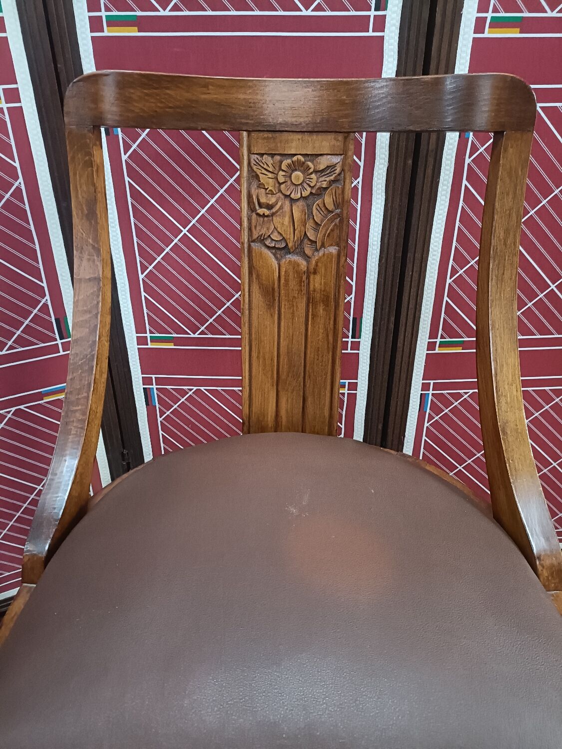 Gondola chair with art-deco motifs, spring leatherette seat