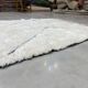 White embossed wool rug 123x165cm