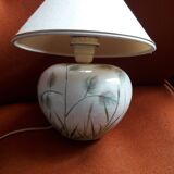 Antique ceramic lamp with floral decoration.