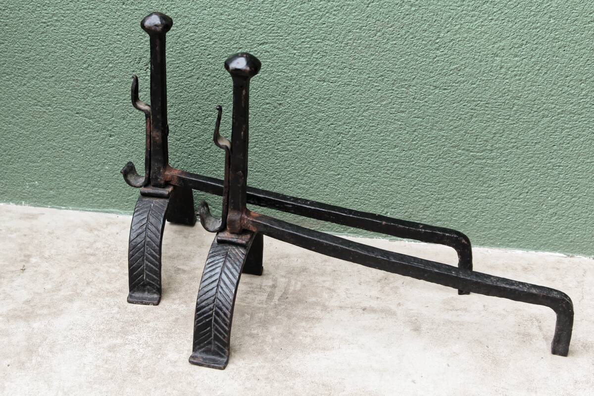 Pair of wrought iron andirons; 17th century