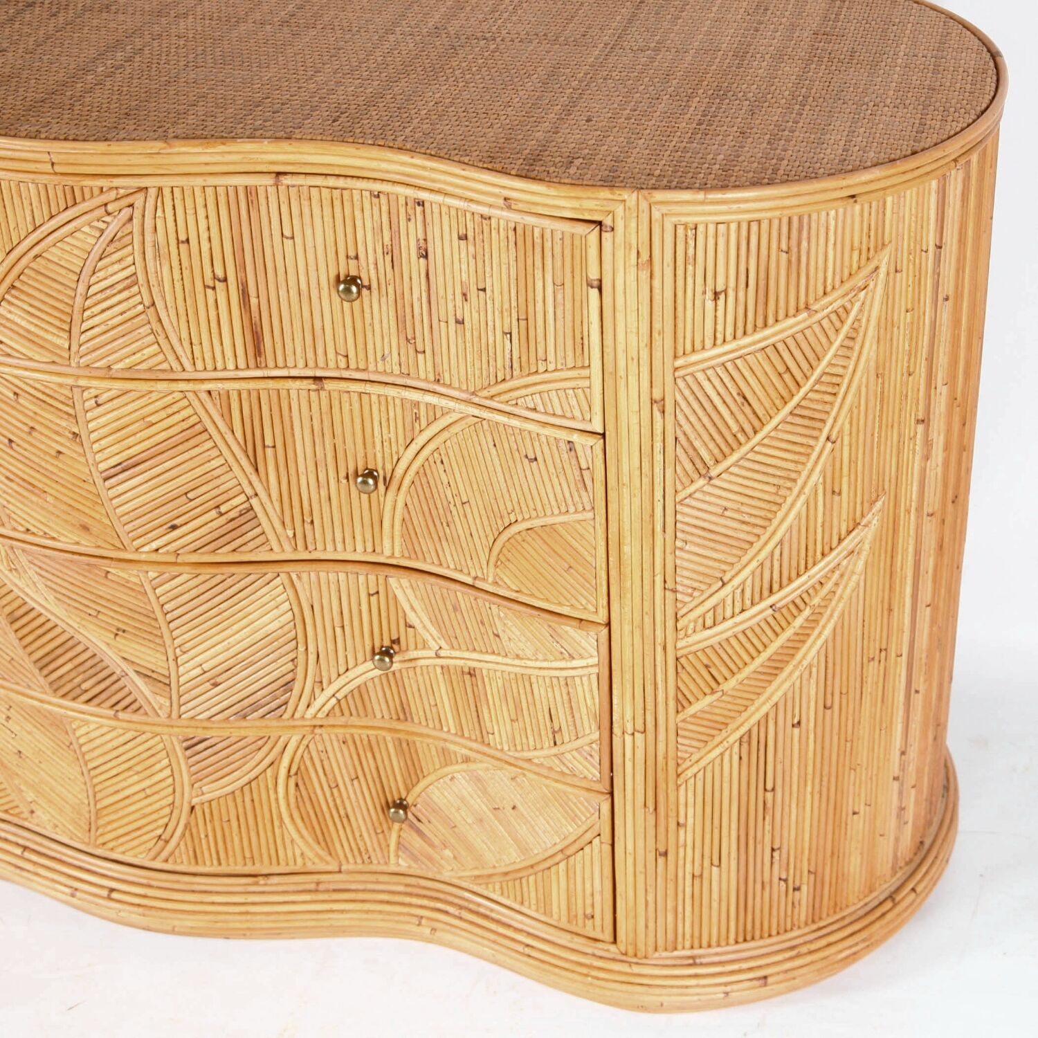 Curved chest of drawers with 4 rattan drawers