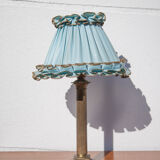 Brass lamp with vintage blue laminated lampshade