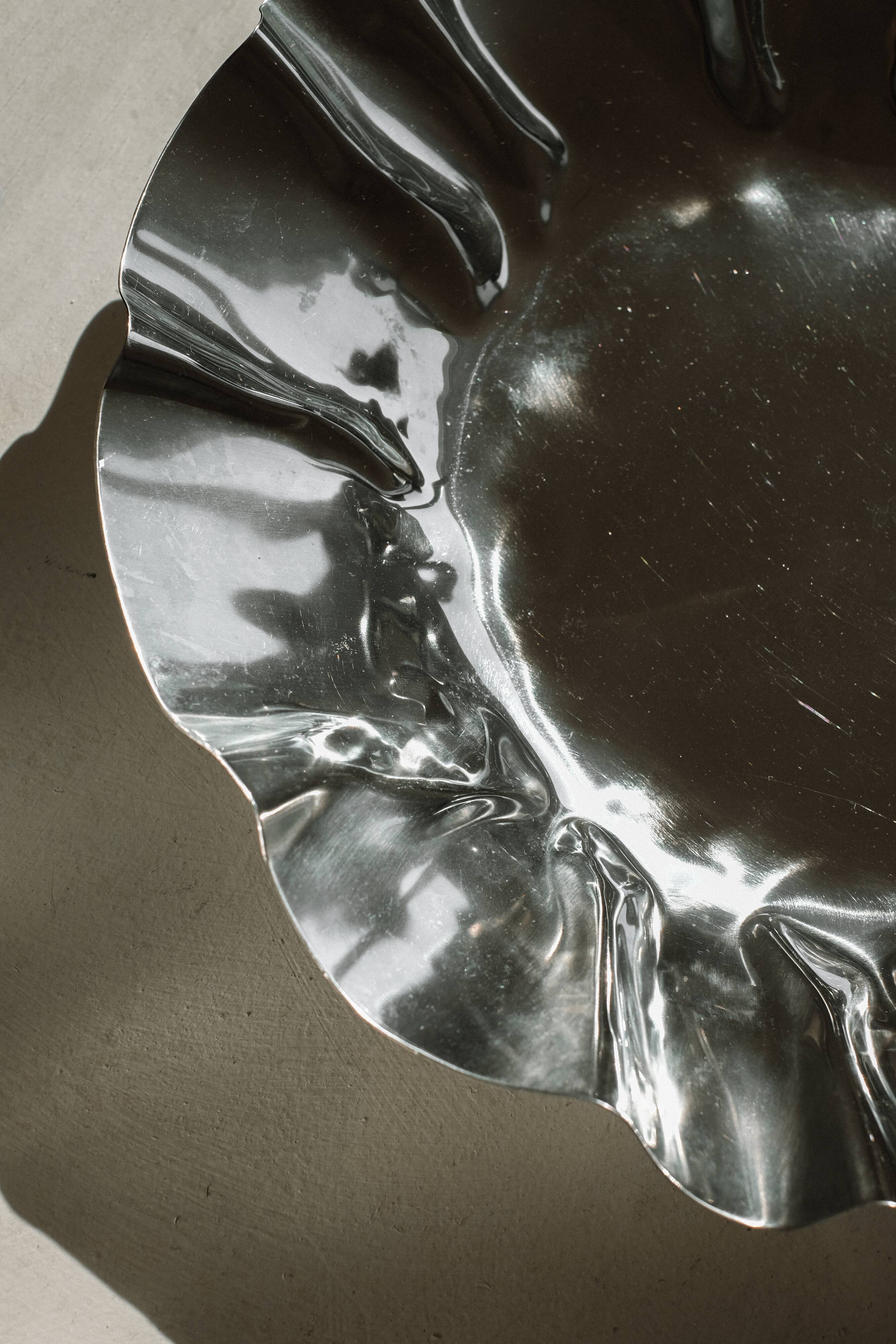 Large folded chrome bowl