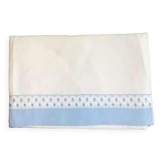 Sheet with blue stripe and embroidered lace