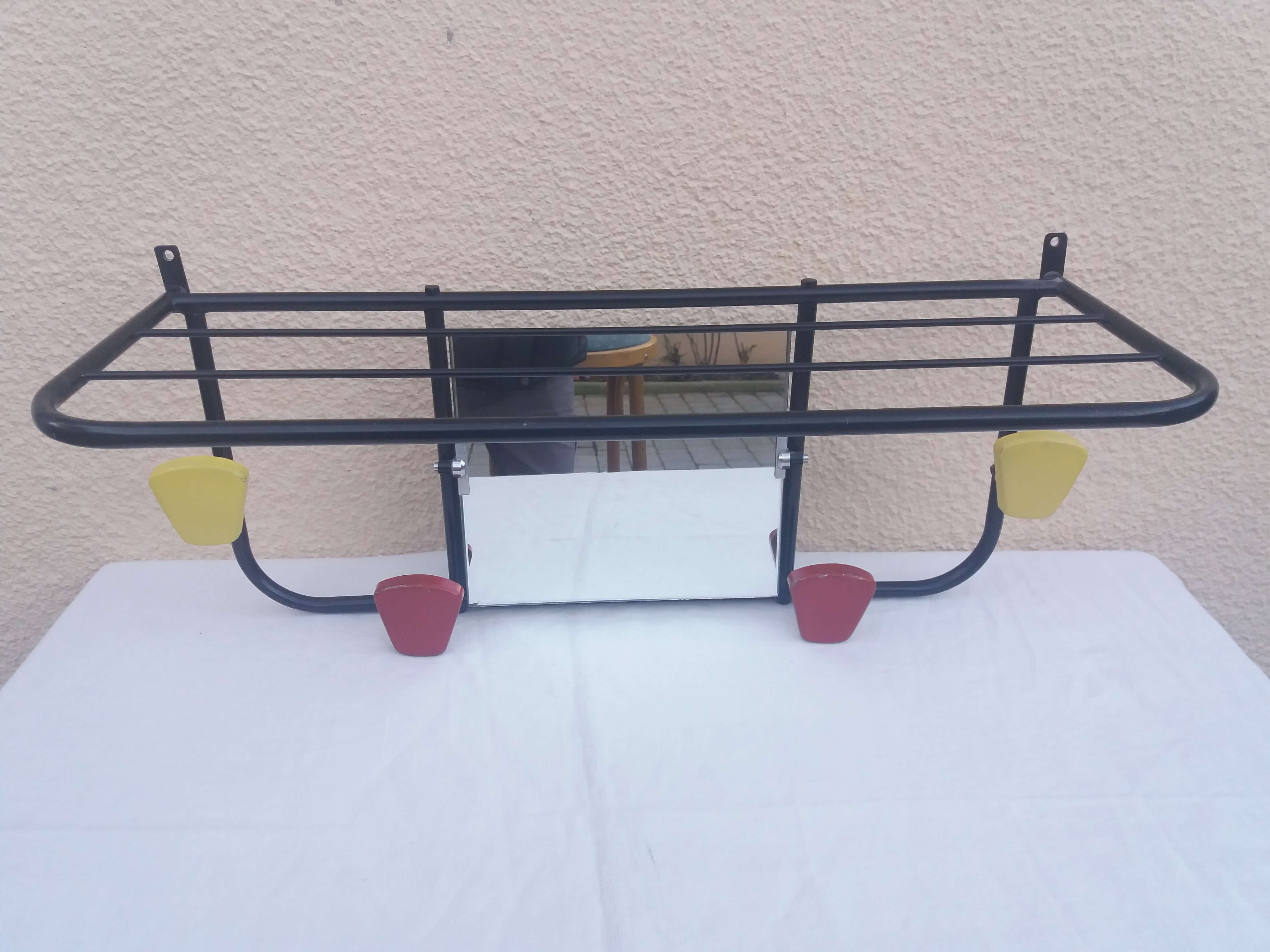 Wall coat holder with mirror